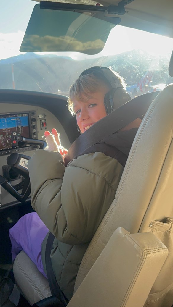 Albie “flying” the plane.