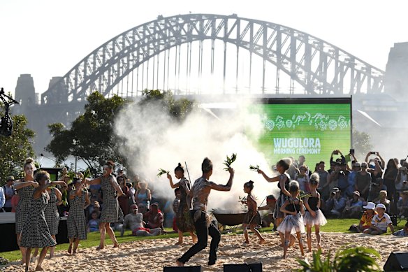 Koomurri dancers perform Galing Spirits during the Australia Day Wugulora Morning Ceremony on the Walumil Lawns at Barangaroo in Sydney.