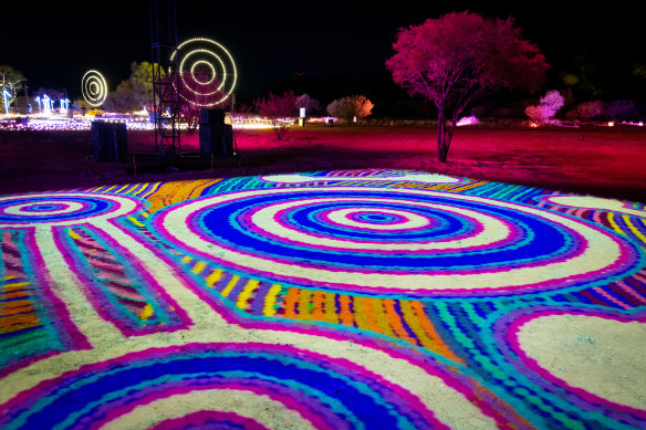 ‘Sisters at Watarru’ by Noreen Dixon, part of the  ‘Grounded’ light show at Parrtjima 2023.