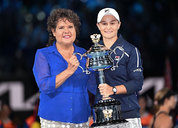 Posing with the Australian Open Women's championship trophy and her idol and Australian tennis legend Evonne Goolagong Cawley, who made the surprise presentation.