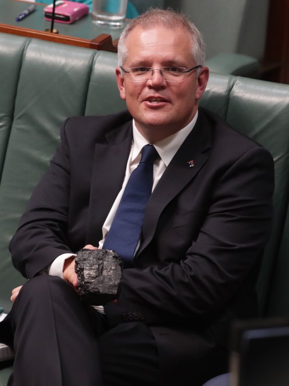 Scott Morrison in Parliament with a lump of coal in 2017.