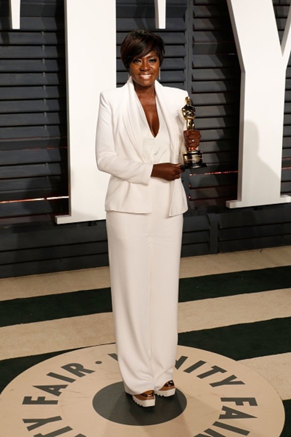 Best Supporting Actress Viola Davis showed how to rock an all-white Brandon Maxwell power suit at the Vanity Fair party. Her metallic sneakers win best comfortable shoe of the evening.