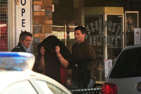 Someone being taken from a cafe where in Ascot Vale where Des Moran was murdered.