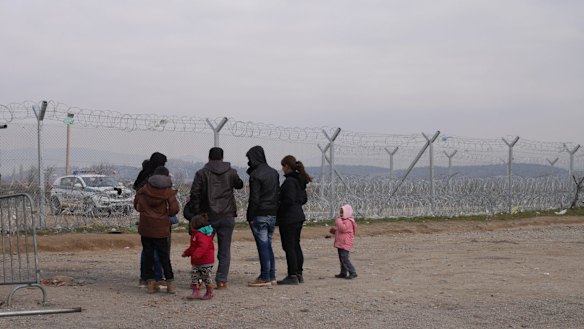A family at the Greek and Macedonian Border.