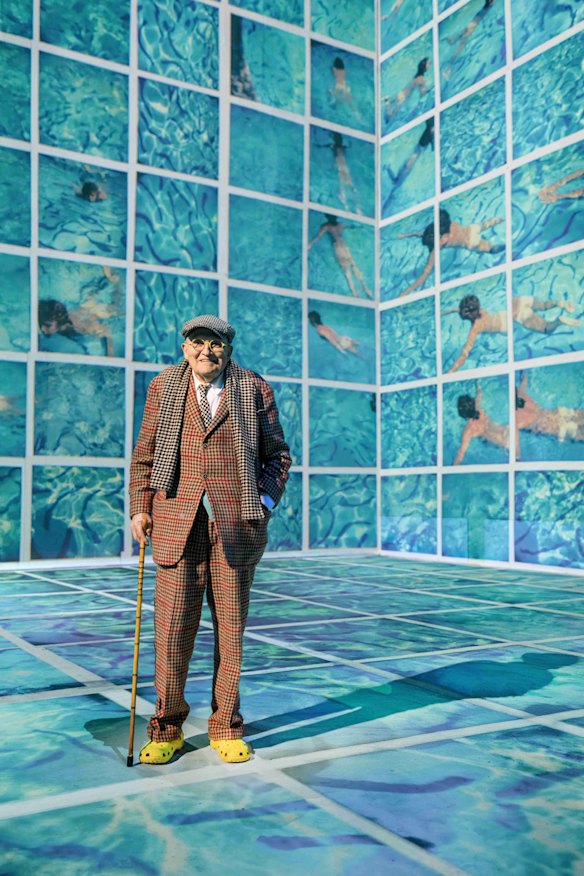 Hockney inspected his installation. 