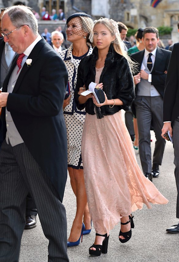 Kate Moss, back left, and Lila Grace Moss Hack, right, arrive for the wedding of Princess Eugenie of York and Jack Brooksbank.