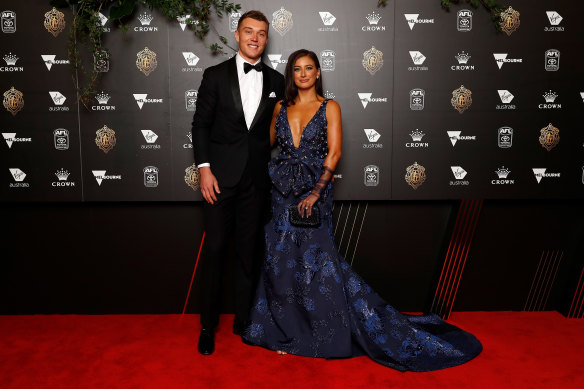 Patrick Cripps, pictured with partner Monique Fontana, had five best on grounds in the opening nine rounds of the count.