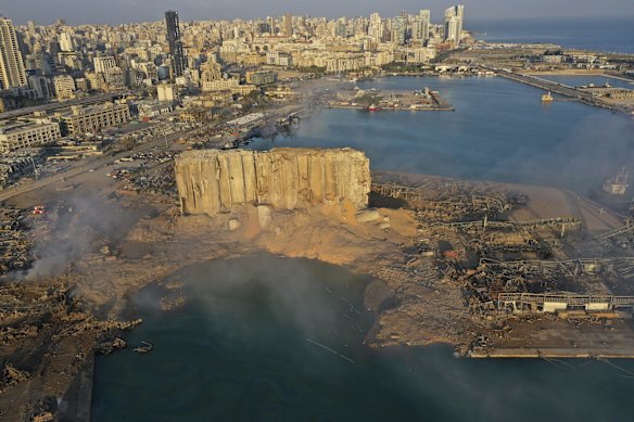 A drone picture shows the scene of an explosion that hit the seaport of Beirut, Lebanon, Wednesday, Aug. 5, 2020. 
