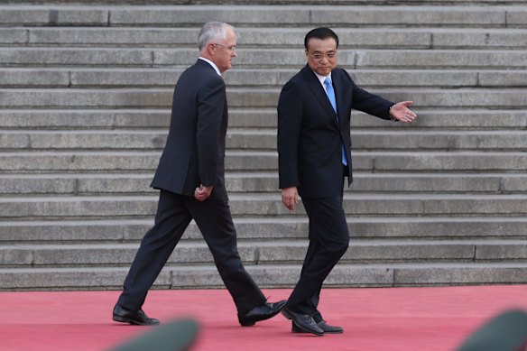 Prime Minister Malcolm Turnbull received a ceremonial welcome at the Great Hall of the People in Beijing China with Premier Li Keqiang who corrected Mr Turnbull to walk on the otherside on 14 April 2016.