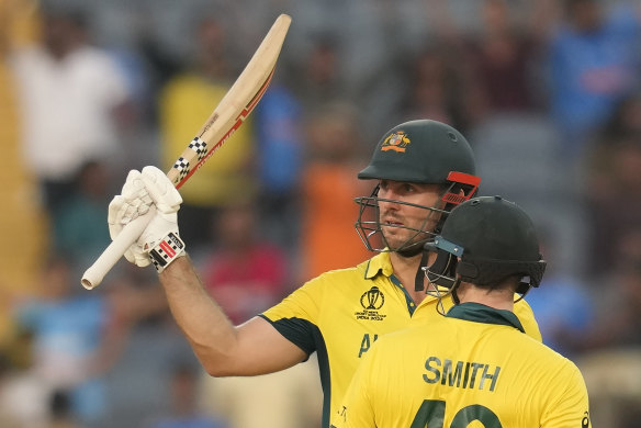 Mitchell Marsh celebrates his 150 runs during the Cricket World Cup match against Bangladesh in India.