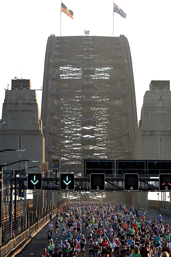 Runners cross the Harbour Bridge during the 2026 Sydney Marathon.