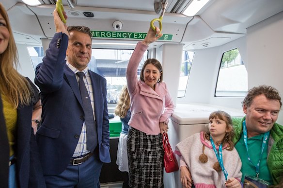  Premier Gladys Berejiklian and Transport Minister Andrew Constance go for a test ride on the driverless train.