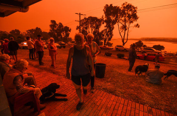 Locals in Mallacoota in January as fires devastated the region over summer.