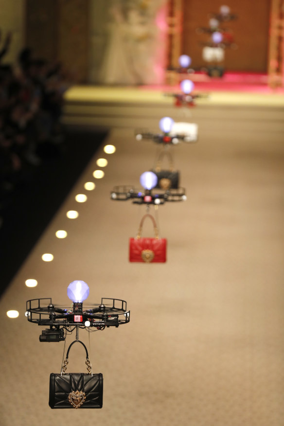 Drones carry handbags as part of the Dolce & Gabbana women's Fall/Winter 2018 show in Milan. 