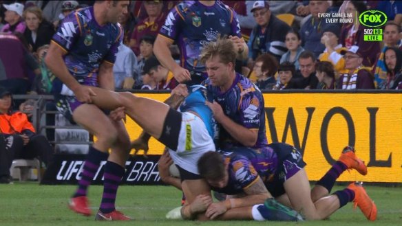 'Wishbone': Cameron Smith has taken an early guilty plea for this tackle on Kevin Proctor.