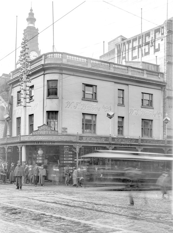 King and George streets, c1901. A policeman directs traffic at the intersection known as 'Waters Corner', on the corner of King and George streets, named for the ladies outfitters here. This was regarded as one of the busiest and most congested corners for pedestrian traffic in Sydney, prompting complaints about loitering and loafing. A proposal to pull the Waters building down in 1902 was an opportunity to widen the footway. Rebuilding did not eventuate until 1913.