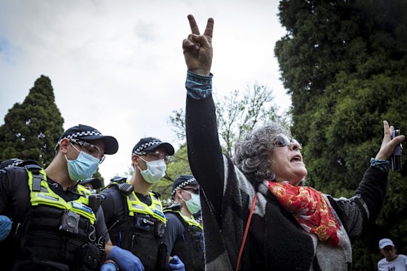 Police clash with protesters at the Shrine.