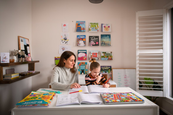 Katie Maynes and her daughter Hannah, 6, have gradually got into the swing of remote learning.  