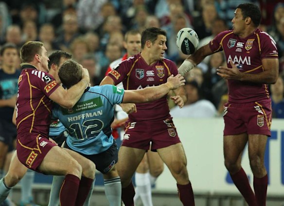 Blues Ryan Hoffman is tackled high.