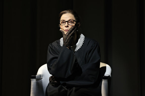 Heather Mitchell as Justice Ruth Bader Ginsburg.