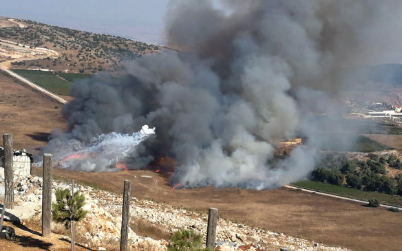 Smoke rises from Israeli army shells that landed in the southern Lebanese border village of Maroun Al-Ras, Lebanon.