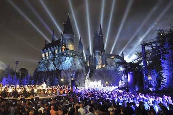 A crowd attends the opening night of The Wizarding World of Harry Potter at Universal Orlando Resort, in Orlando, Florida.