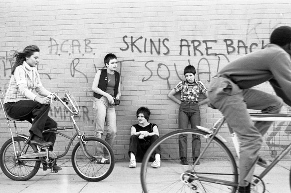 A group of teenagers hanging out in the 1970s.