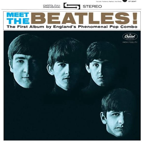 Robert Freeman photographed the iconic photo for the cover of <em>Meet the Beatles</em>. 