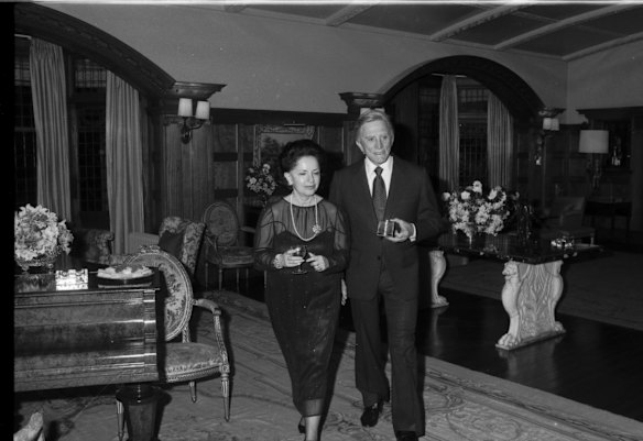 Lady Mary Fairfax and Kirk Douglas at a party given by the Fairfaxes for Kirk Douglas at Fairwater in Sydney on 16 September 1980.