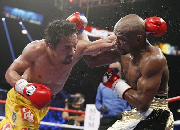 Manny trades blows with Floyd.