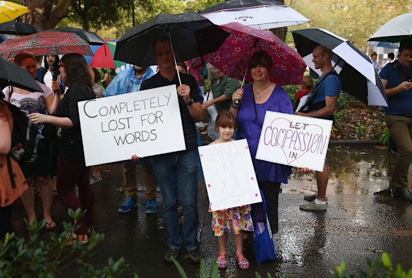 SYDNEY, AUSTRALIA - MARCH 16:  Protesters brave the wet and miserable conditions to demonstrate against the Abbott led Coalition Government on March 16, 2014 in Sydney, Australia. March In March is a nationwide grassroots protest organized to deliver a statement of no confidence in the current Australian Government.  (Photo by Don Arnold/Getty Images)
