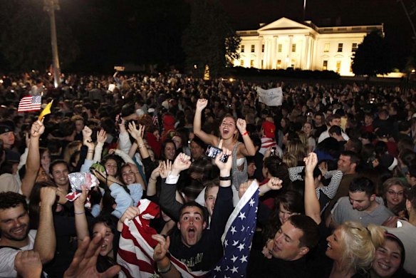 Crowds celebrate the news outside the White House.