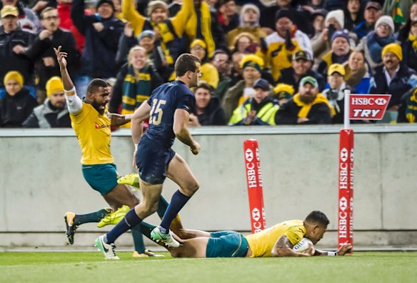 Wallabies fullback Israel Folau sores in the corner during the Rugby Championship's fourth round clash between Australia and Argentina at Canberra Stadium. 
