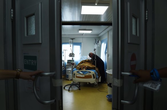 Abdulrahman Abdulaaly, 18,  at the ICU in Athba Field Hospital, Iraq.