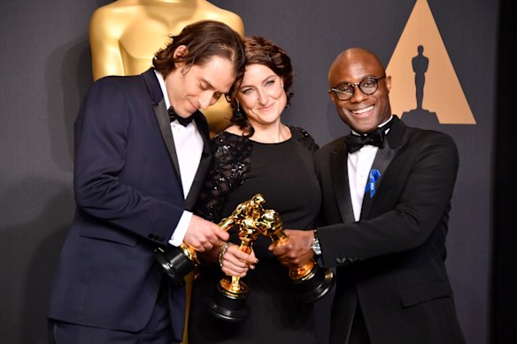Producers Jeremy Kleiner and Adele Romanski and director Barry Jenkins with their best picture Oscars.