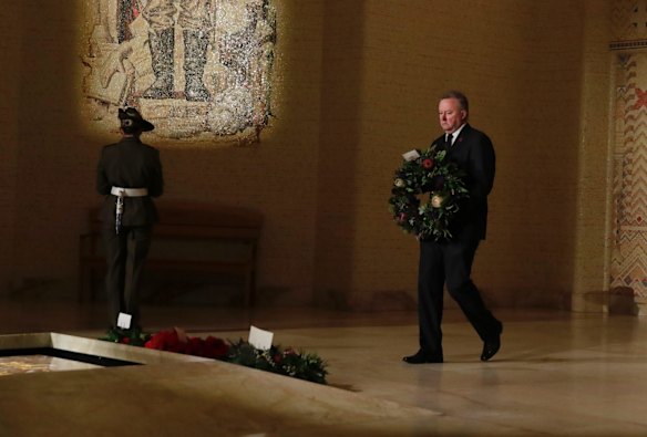 Federal Opposition Leader Anthony Albanese lays a wreath at the Tomb of the Unknown Australian Soldier during the Anzac Day commemorative service at the Australian War Memorial in Canberra.