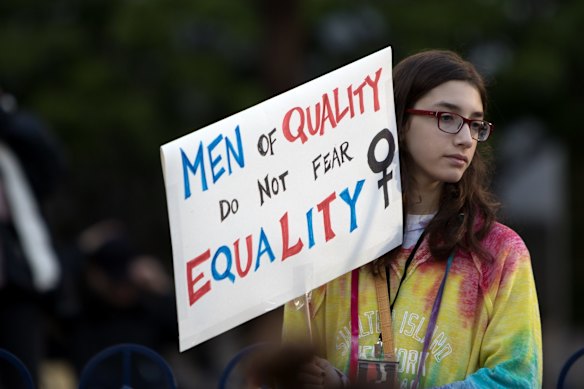 A demonstrator holds a sign at Pershing Square during the Women's March of Los Angeles in Los Angeles, California, U.S.