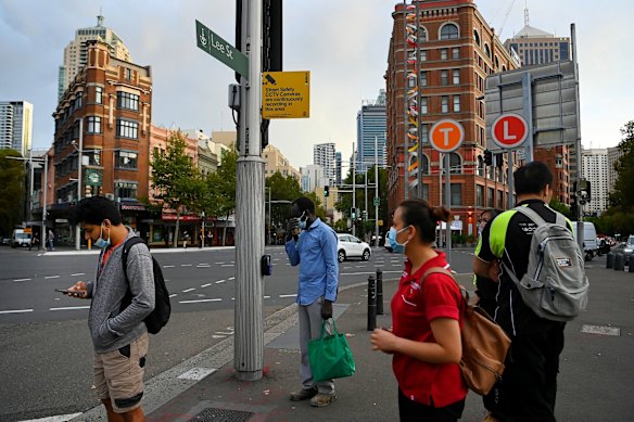 Stranded commuters around Central Station on Monday.