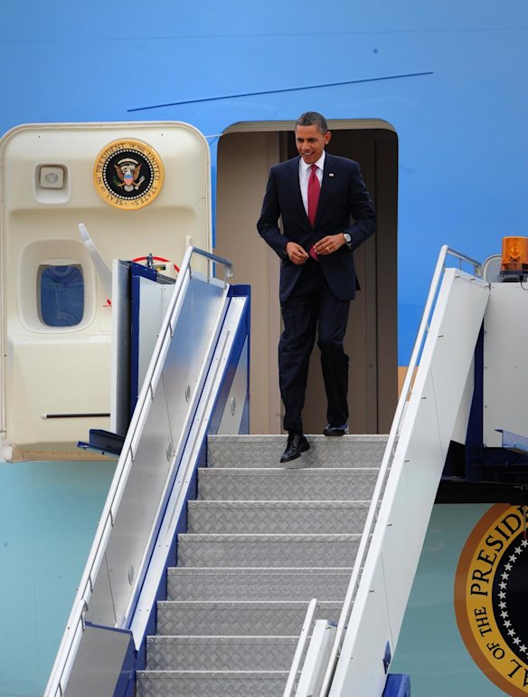 President Obama's plane lands in Canberra.