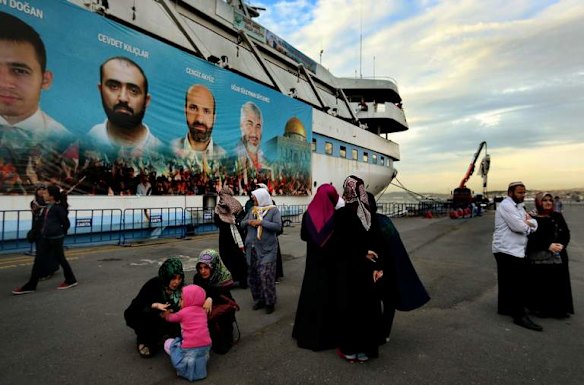 The Mavi Marmara ship with a banner displaying the images of some of the ten men killed when attacked by Israeli soldiers during the 2010 Flotilla incident.