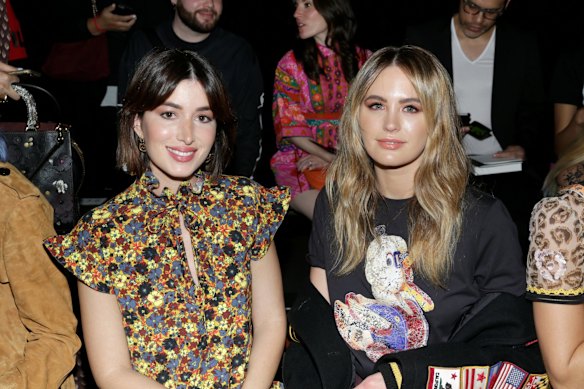 Jesinta Franklin (R) and fashion blogger Carmen Hamilton at the Coach spring 2018 show during New York Fashion Week on September 12, 2017.