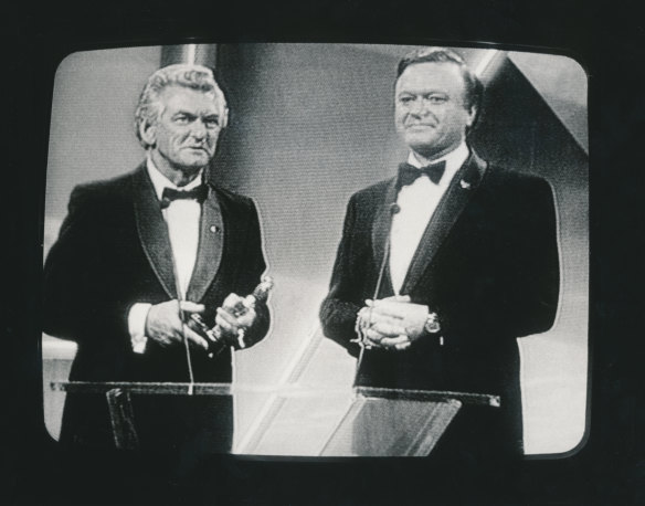 Prime Minister Bob Hawke in 1984 presents Bert Newton with his Gold Logie.