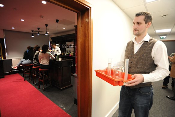 Outside the fake bar.