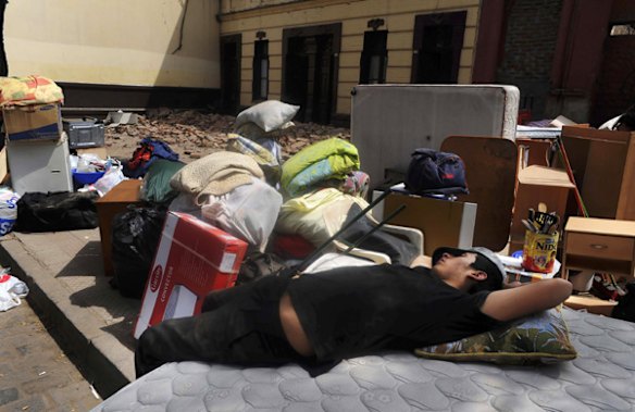 Chaos on Santo Domingo Street in Santiago.