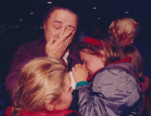 Foster mother Zanaip Samorukoff farewells two of the children in her care during their unexpectedly extended vacation in Australia. The children were guests of the Victims of Chernobyl National Relief Fund, 1993. Photo: James Braund

File (Melb): SOVIET UNION: ACCIDENTS & DISASTERS: NUCLEAR: CHERNOBYL: 1991 - .
Date filed: 28-11-1993
Neg no: 93-47466 / 9
ID: mls