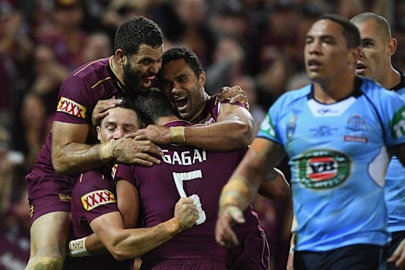 Dane Gagai of the Maroons celebrates scoring a try with Cooper Cronk, Greg Inglis and Justin O'Neill