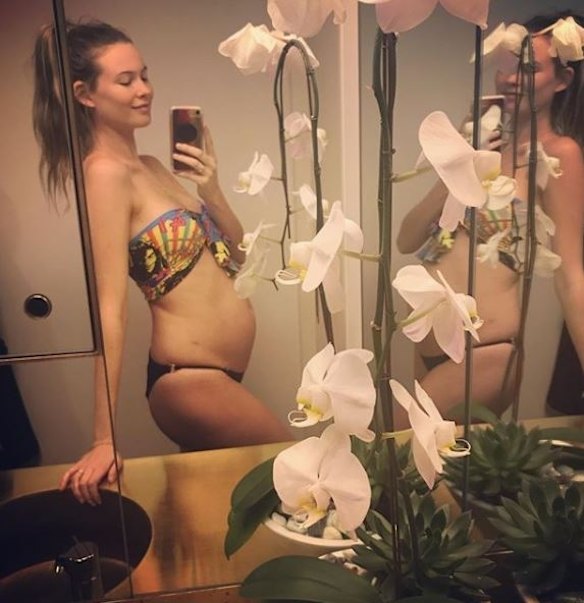 Model Behati Prinsloo announced on Instagram is September that she was expecting her second child with singer Adam Levine. "ROUND 2....." the model posted alongside a photo of herself in a bikini, showing off her baby bump. This will be the second child for the pair who welcomed a baby girl named Dusty Rose one year ago in September 2016.
