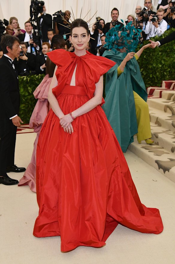 Anne Hathaway in Valentino attends The Metropolitan Museum of Art's Costume Institute benefit gala celebrating the opening of the Heavenly Bodies: Fashion and the Catholic Imagination exhibition on Monday, May 7, 2018, in New York.
