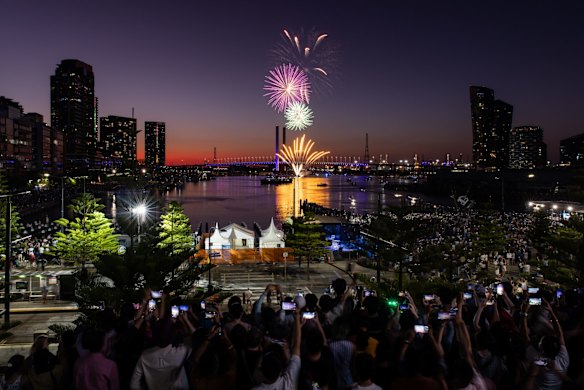 Family fireworks are seen over the Bolte Bridge.