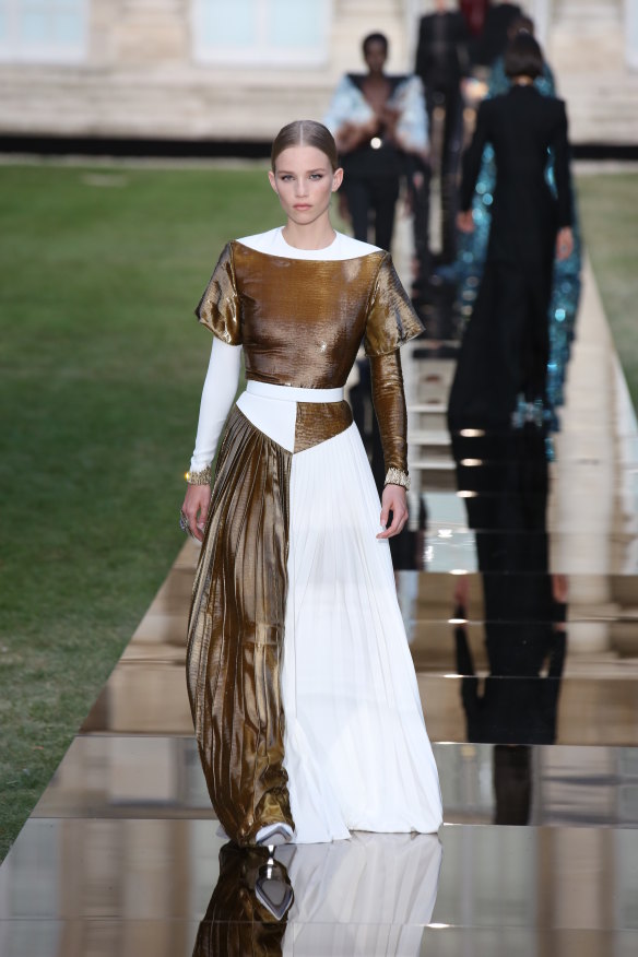 A model wears a dress by Givenchy during couture week on Sunday.